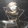 A humanoid sculpture broken and peeled off in layers exposing gold underneath